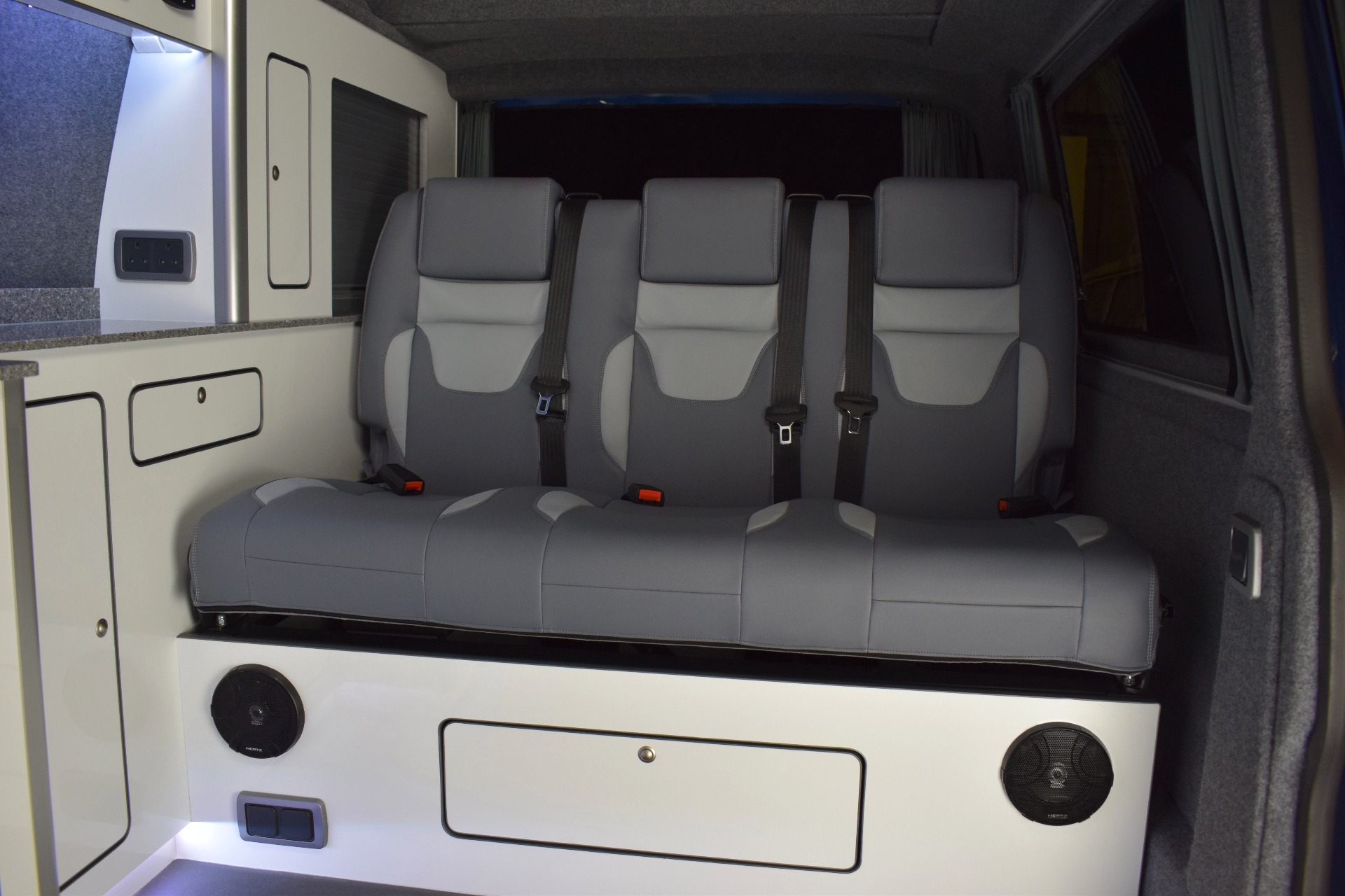 3 seater RIB rock n roll bed upholstered with a nod to the Sportline SE